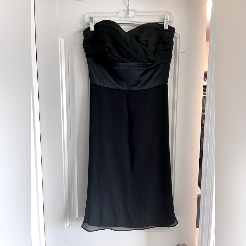White House Black Market Tea length black dress.